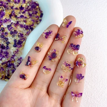 10vnt noctilucent nagų dalių papuošalai Derva violetinės gėlės drugelio lankas 3D nagų dekoravimas 